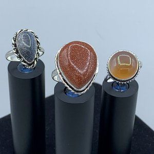 Set Of 3 Silver Toned Rings With Orange & Grey Stones